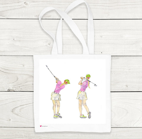 Two Ladies Playing Golf Printed on a White Tote Bag 