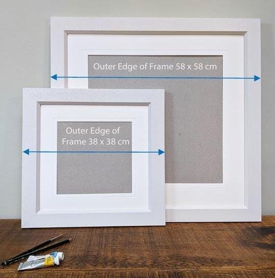White wood frames for artwork by artist Sheila Gill