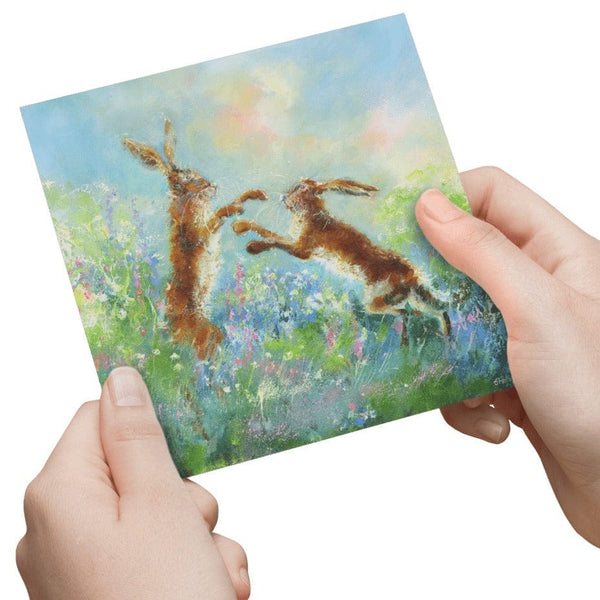 Hares in Action Greeting Card designed by artist Sheila Gill